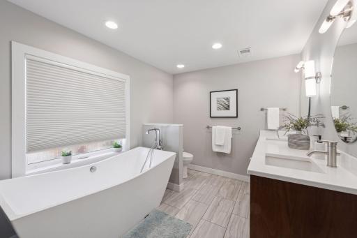 Freshly remodeled Primary Bathroom with double sinks, large soaking tub and separate shower.