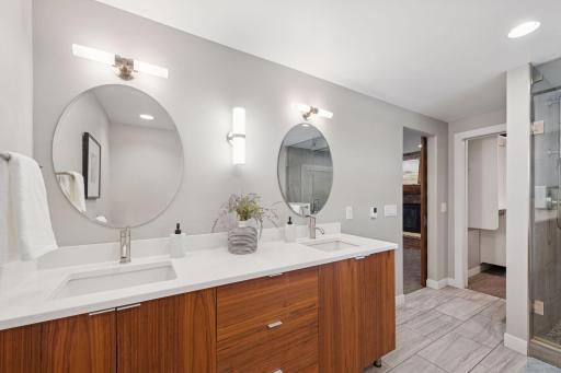 Primary suite has access to a large walk-in closet.
