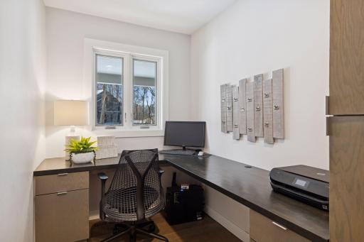 Main level office space located between the mudroom and the kitchen/living room.