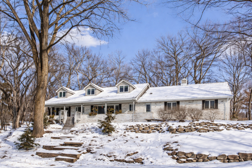 AI-enhanced image illustrating how the home could look with a whitewashed brick exterior