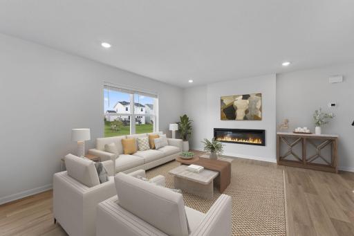 Introducing our Kingston Floorplan! Set the mood with your modern electric fireplace where you can adjust flame and rock colors. Live in luxury. (Picture virtually staged for representation only.)