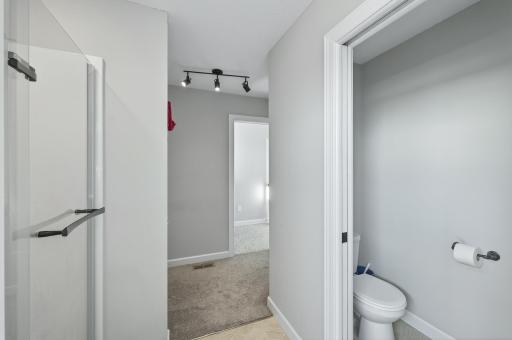 Separate shower and toilet in the primary bathroom