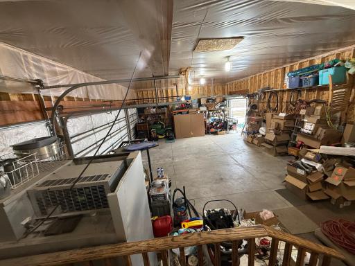 Huge, spacious 5 car garage, partially finished/insulated. Ready for all of your garage/storage needs.