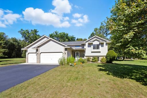 Inviting home with a 3-car garage and charming front entrance.