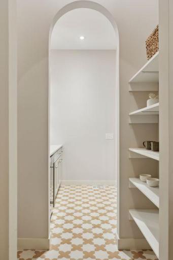 Pass through pantry from mudroom to prep kitchen