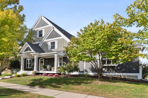 Beautifully maintained three-story custom home in Spirit of Brandtjen Farm.