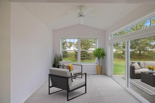 Virtually staged sunroom and patio