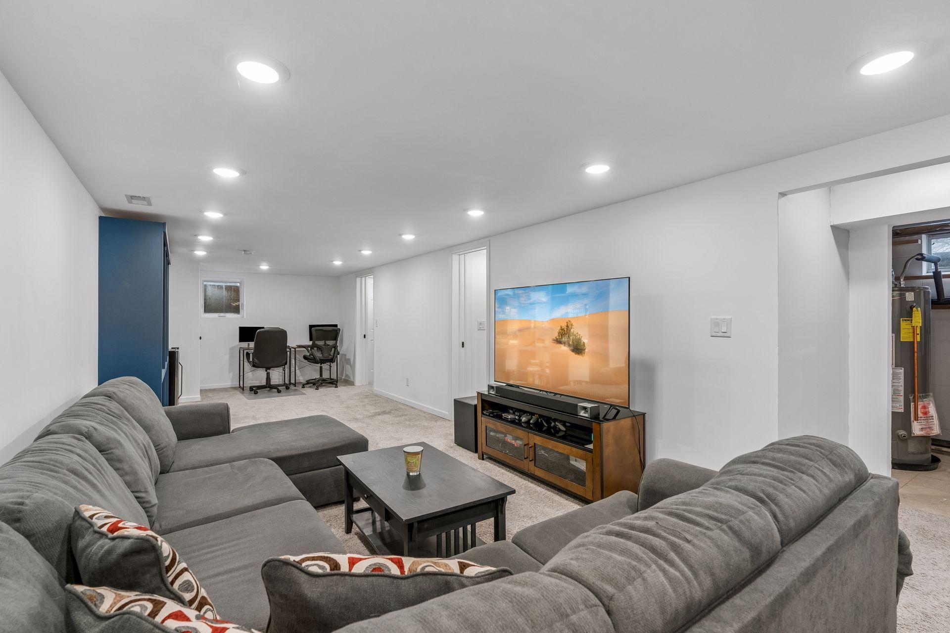 In addition to the main floor living room and family room, this lower level family provides additional entertaining space.