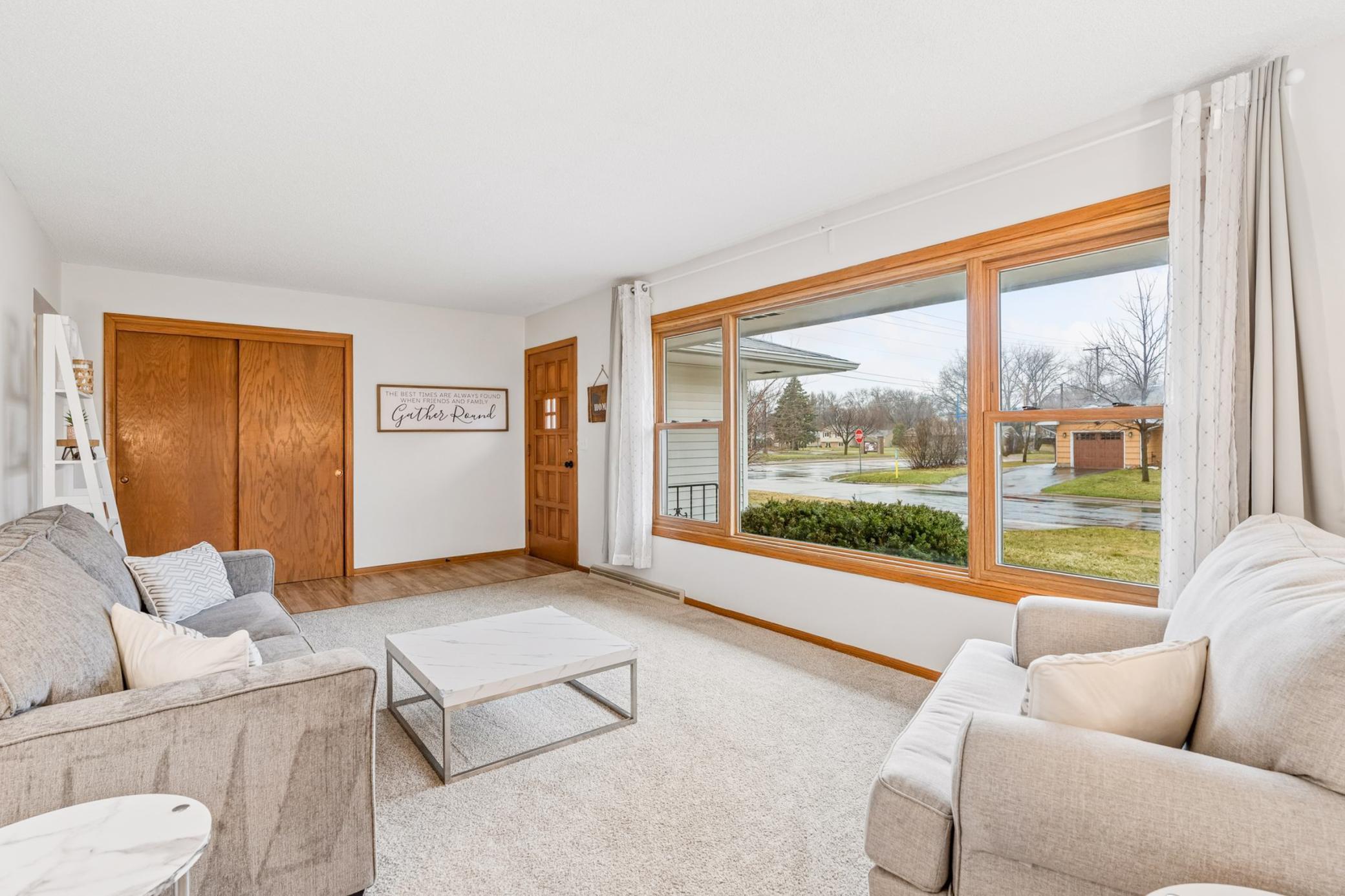 Bright and airy front living room with gorgeous picture window.