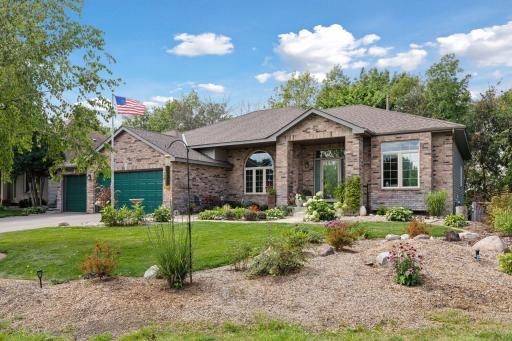 This handsome, full brick front ONE Story is situated on a quiet cul-de-sac. Magnificently landscaped all around the home and property. Also note the steeply pitched roof (new 2021) - a clue to the 10 FOOT high ceilings you will find inside.