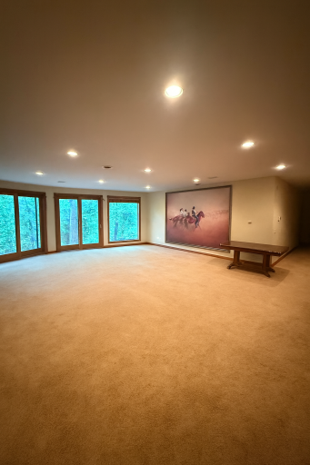 Virtually Staged Photo of Lower Level Family Room