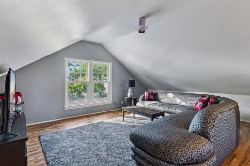 This upper level has had many uses over the years. Currently used as a family room-it also makes for a great owners suite!