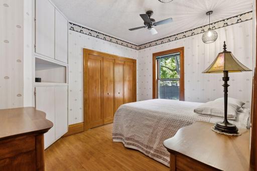 Closet panel doors recently refinished. This room overlooks the yard & pool.