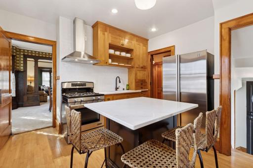 This right sized center island is home to the dishwasher & informal seating.