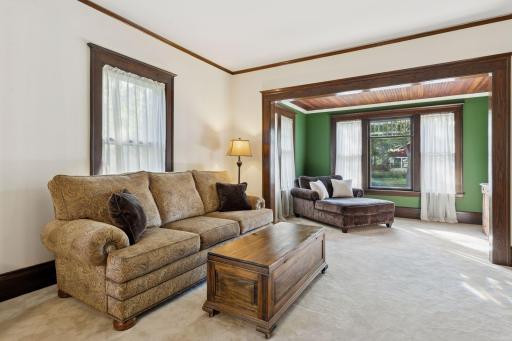 Large archways and an abundance of south- and west-facing windows fill the home with natural light.