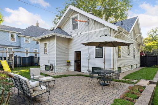 A stunning paver patio-great for conversation with while watching friends & family swim.