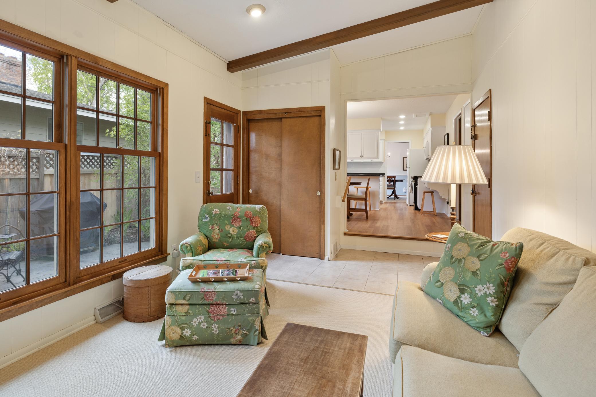 Enjoy the outdoor gardens while relaxing in the family room...