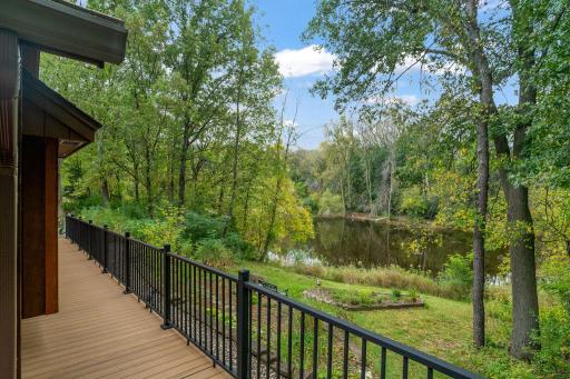 Stunning pond views from the main level bedroom/office.