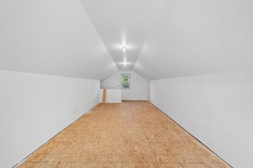 Upper level finished detached garage