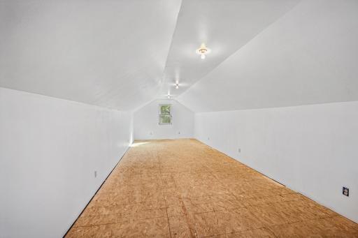 Man cave space above workshop garage