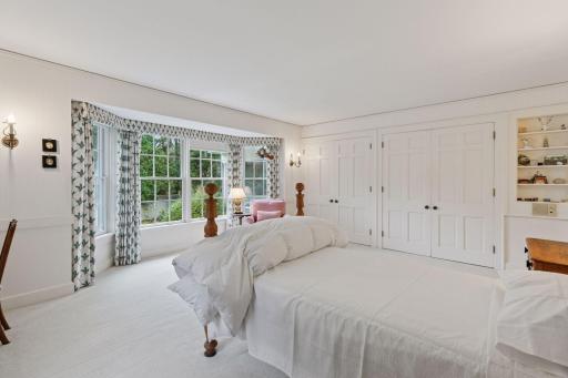 Primary suite literally has a wall of closets as well as a walk-in closet