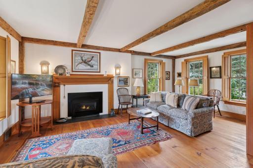 The family room has wide cedar plank flooring as well as beams chosen specifically for this home, milled in Pennsylvania