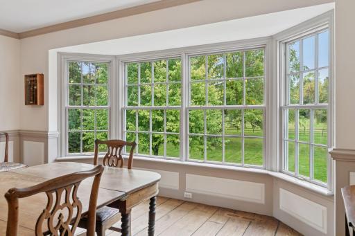 This dining window overlooks the back acreage of the home, perfect for watching the wildlife.
