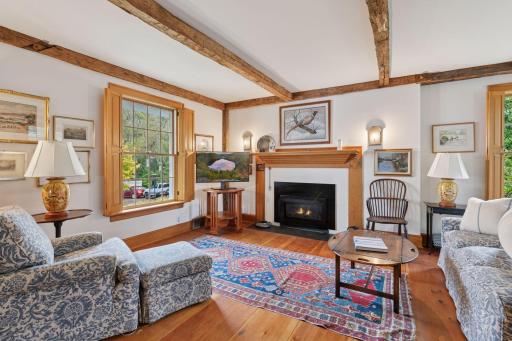 Wood shutters and gas fireplace in family room