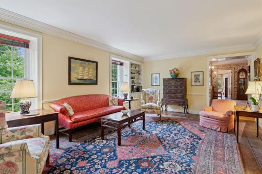 The woodwork!! Crown moulding, chair rail and wood floors are in perfect shape