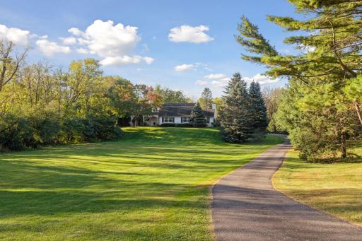 Set back from the road, this is your private oasis