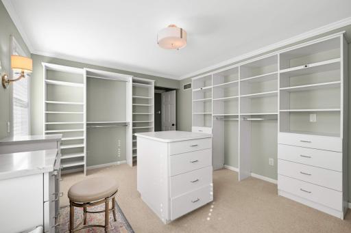 Two additional walk-in closets further enhance convenience, ensuring that the suite is as functional as it is indulgent.