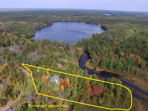 Welcome to nearly 3 beautiful acres of your very own private paradise. Vaulted 2003 built lake home with insulated XL 2 car lofted garage w/Rec Room & bedroom perched on Burlingame Lake inlet. Borders are approximate.