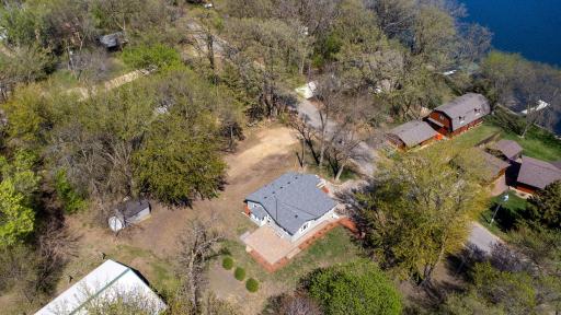 Imagine all this outdoor space! Just a few steps to Lake Minnie Belle. Add additional garage space or shed.