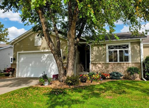 Welcome to 819 Monet Ct! It has great curb appeal with its warm and inviting front elevation, mature landscaping and classic architectural details.