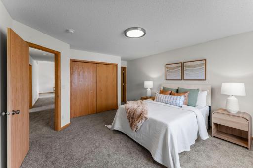 Large primary bedroom with access to main floor bathroom.
