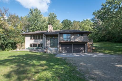 Front view - maintenance-free exterior featuring updated windows, 50 year roof, and steel siding