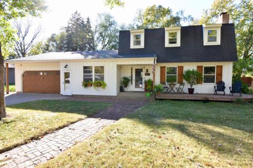 Amazing Curb Appeal with Paver Sidewalk, Inviting Front Porch, and Stunning Architectural Design!!!