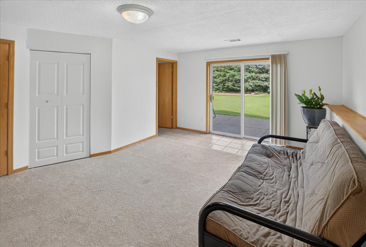 Walk-out lower level to beautiful aggregate patio