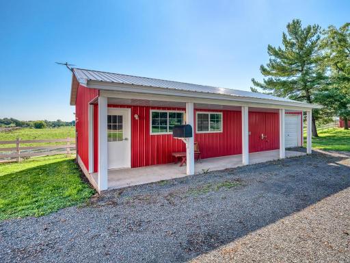Use your imagination as to how to this shop building with single attached garage will be used.