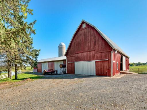 Up close of the older barn and vehicle storage.