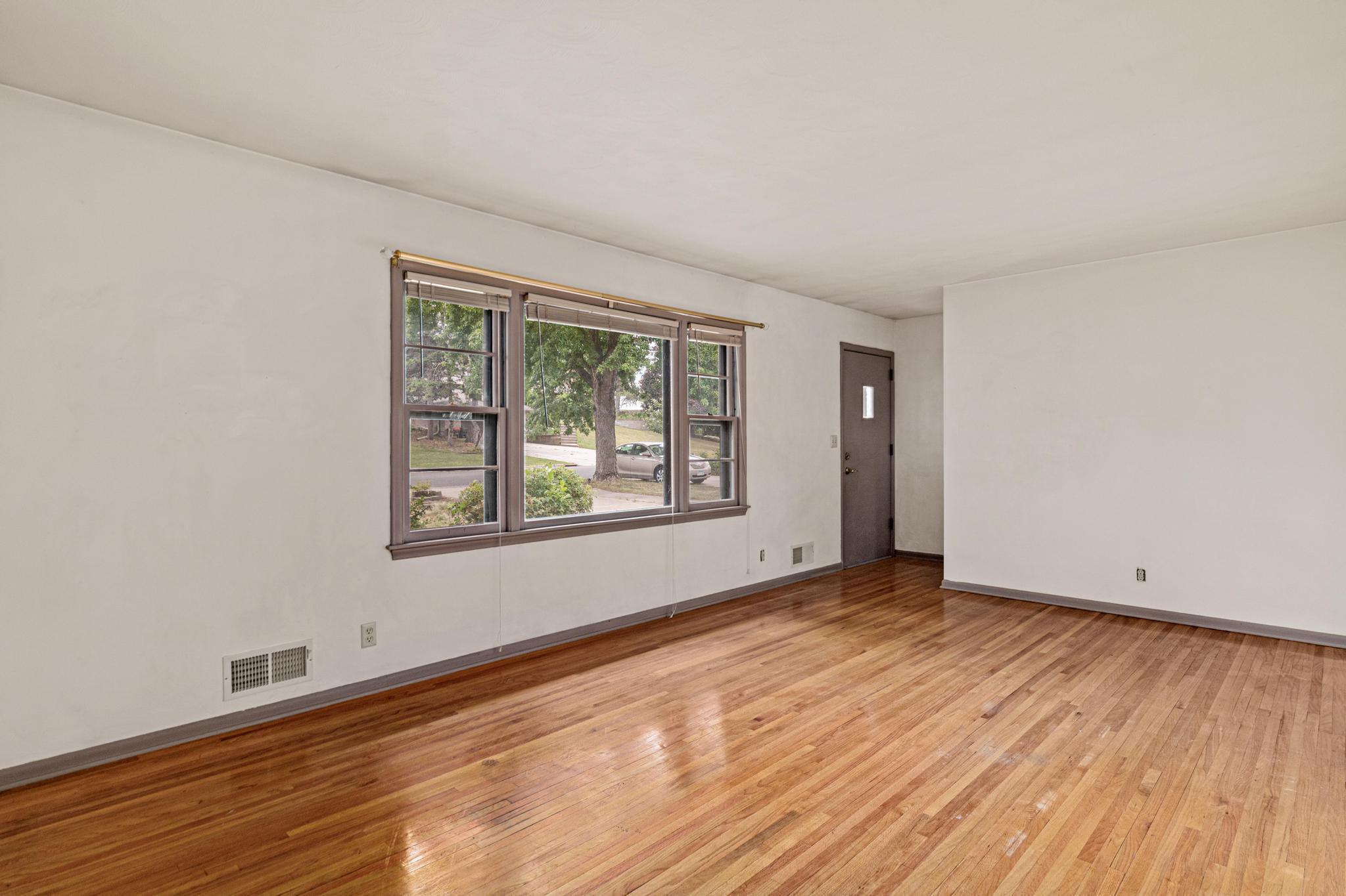 Gleaming hardwood floors in living room!