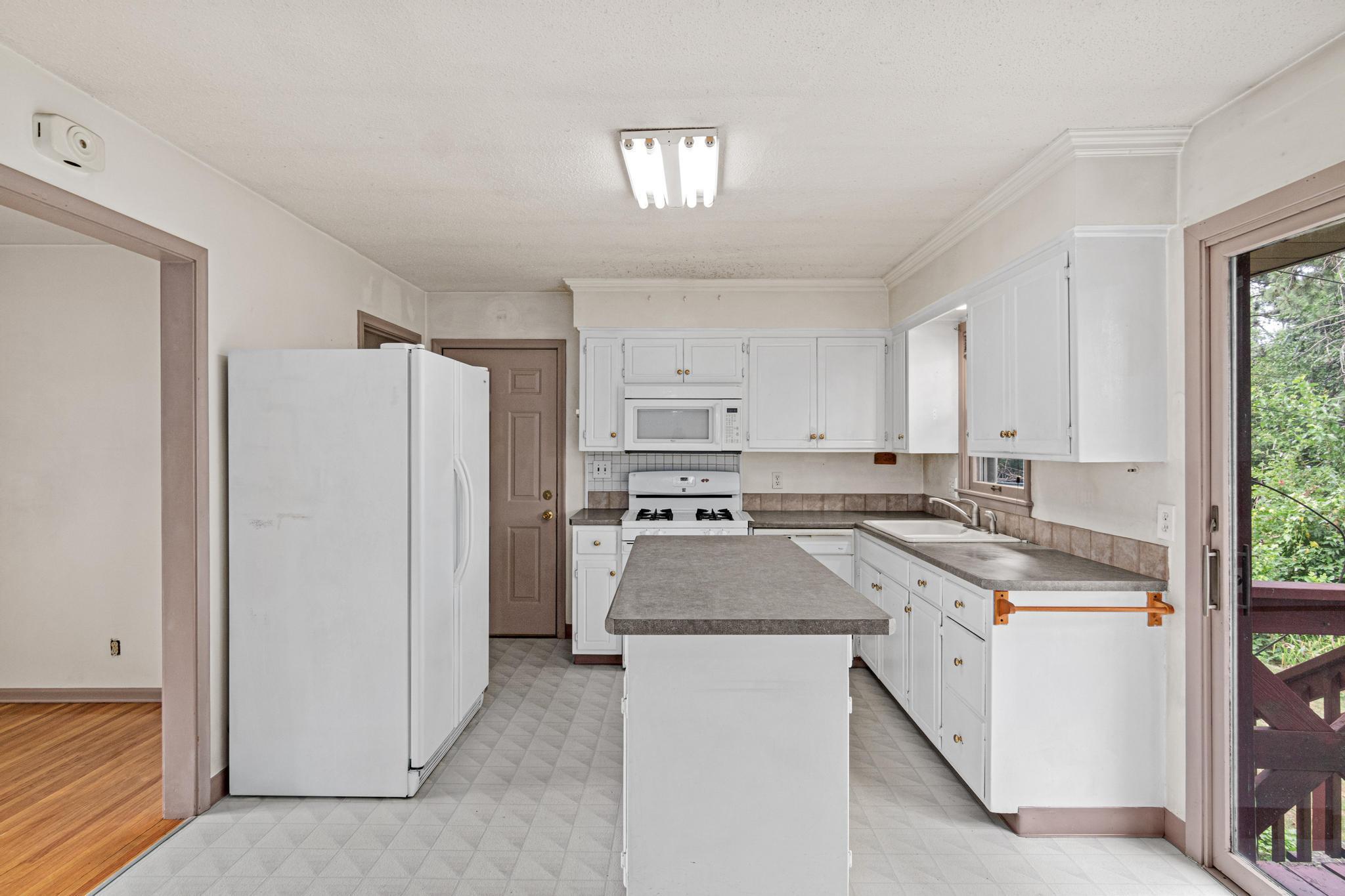 Kitchen has center island with extra storage!