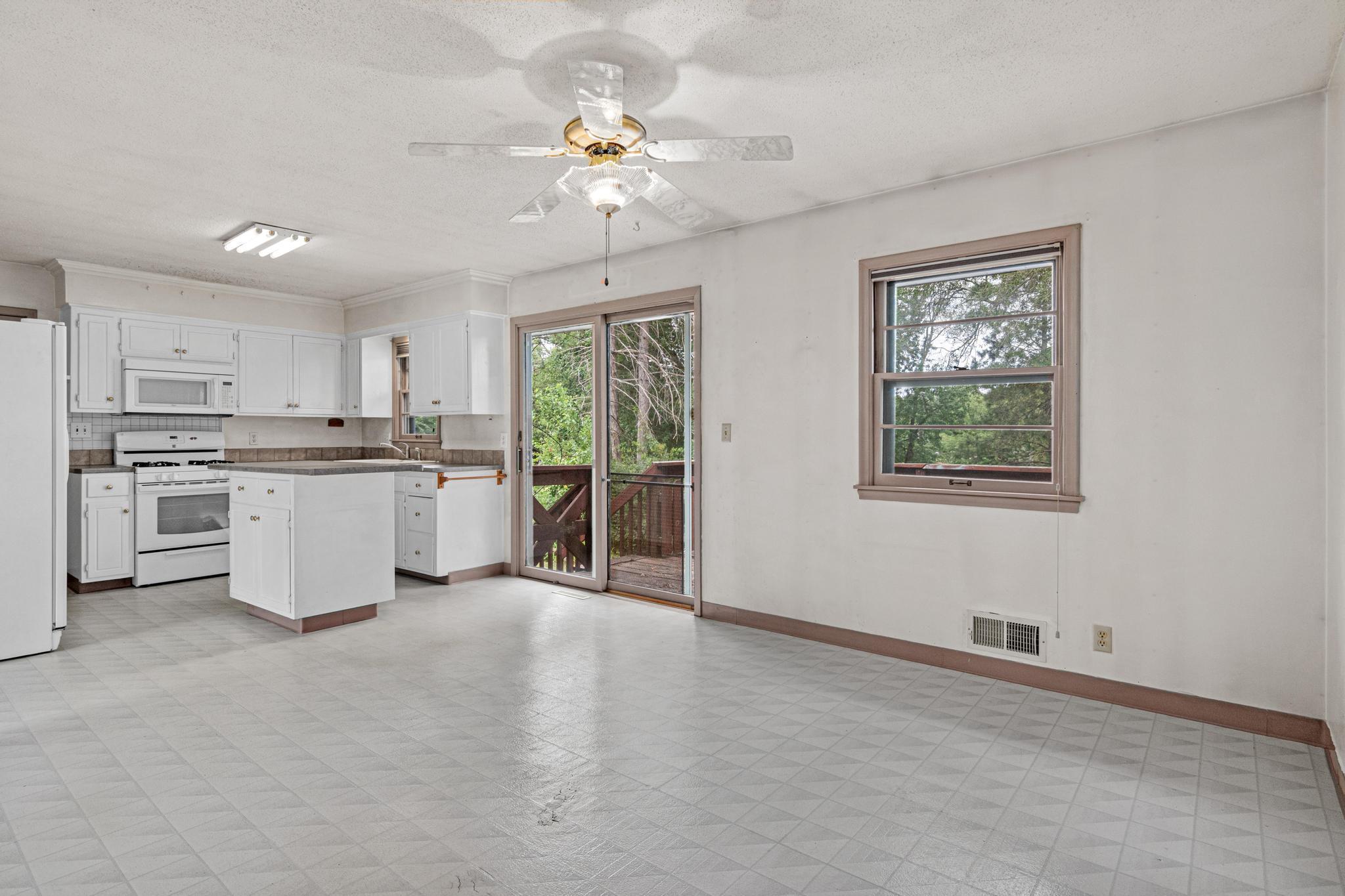 Large eat-in kitchen with walkout to deck and backyard!