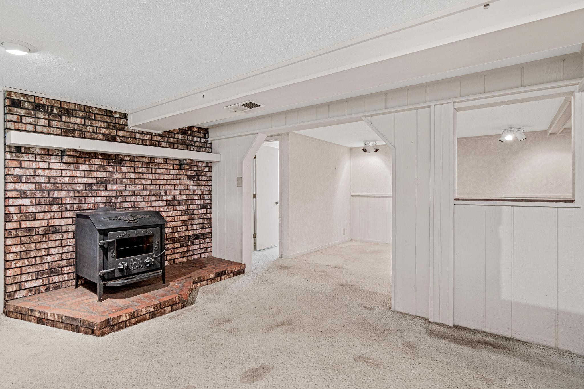 Open this wall between family room and bonus room for large gathring space in lower level!