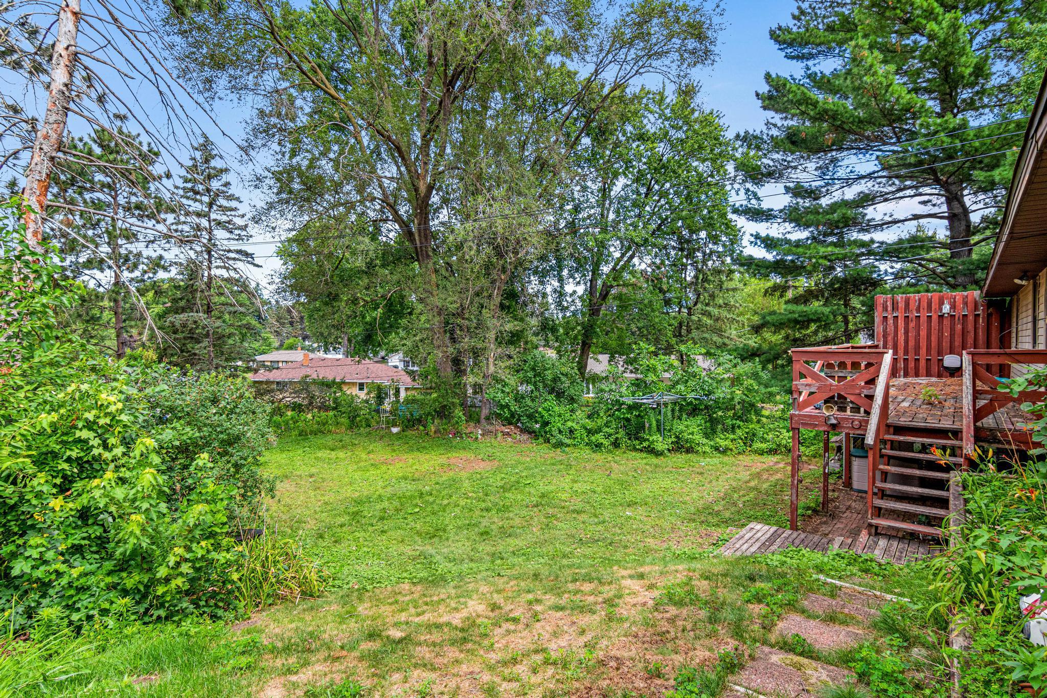 Nearly 1/3 acre of land with gardens and privacy!