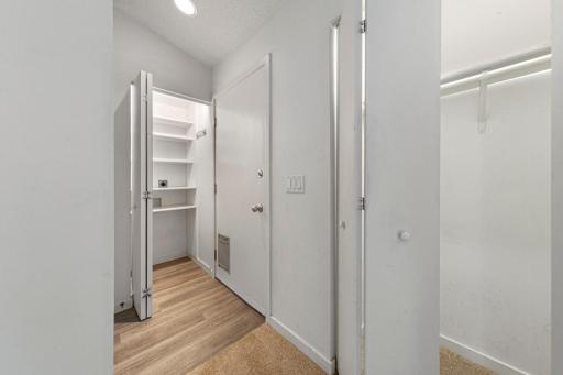 Pantry that has a main floor washer and dryer hook up
