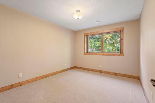 Bedroom 3 of 3 in the lower-level with a walk-thru to the 3.4 bath