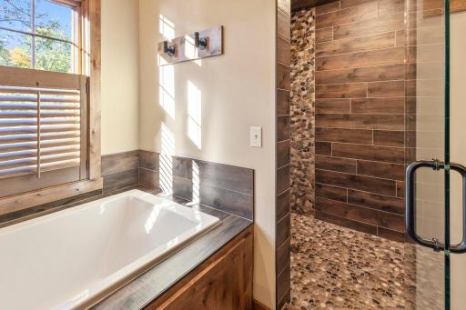 An extra large soaking tub and a stunning walk-in shower