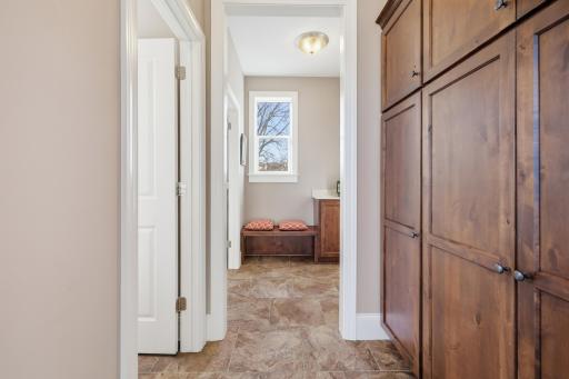 Plenty of storage as you enter from the garage