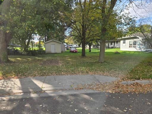 Another driveway approach to your backyard off of Sunrise Avenue. Plenty of room to build a large garage, the city approved a 32x45 shed w/14ft. sidewalls a few years ago, it could be yours now! Current shed is 14 x16 w/cement floor